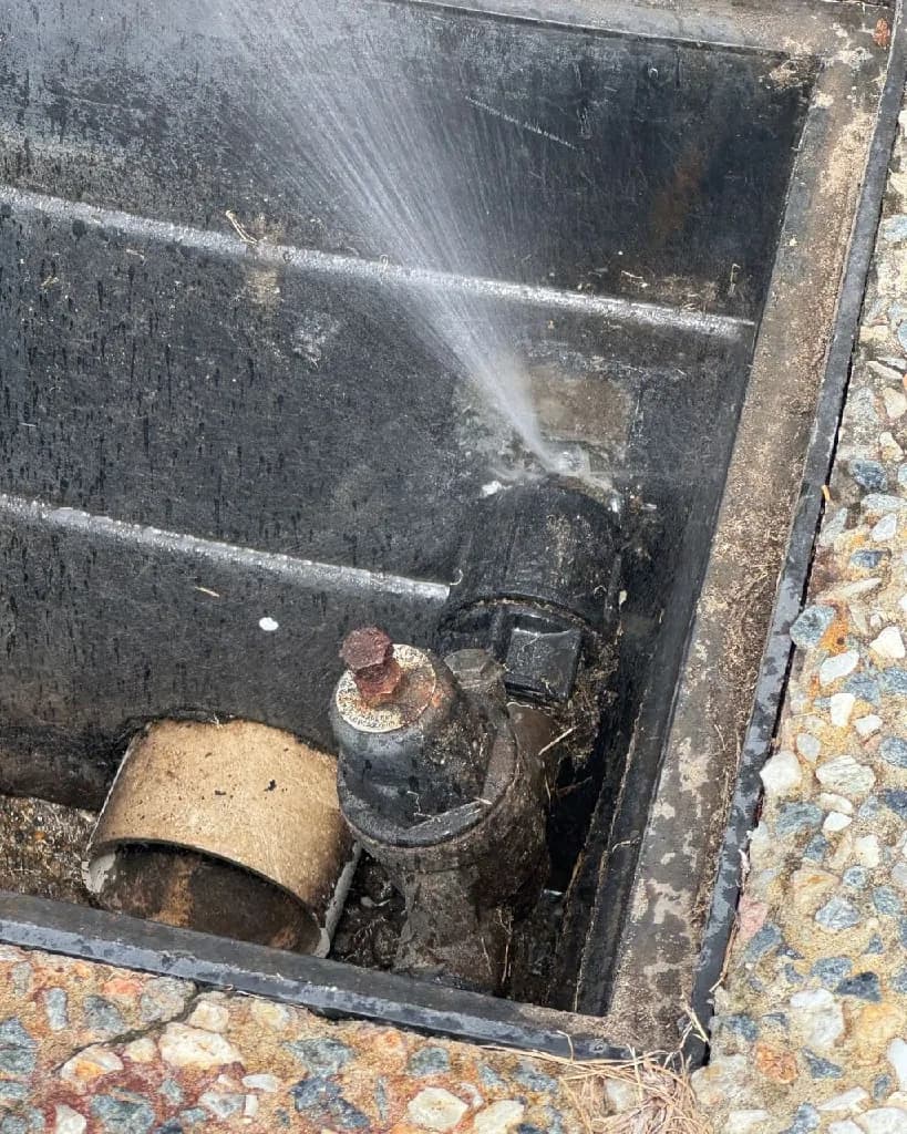 Big Blue Plumbing plumber repairing a burst pipe