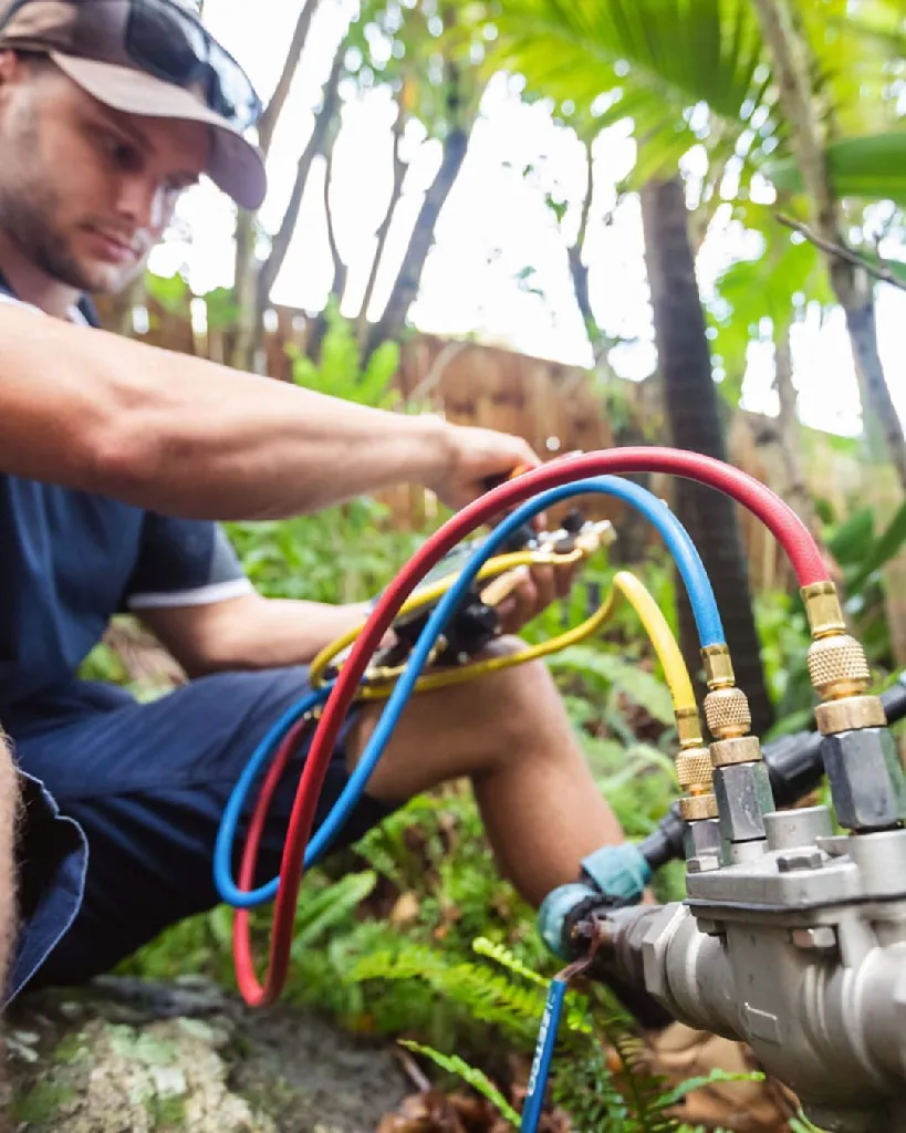 Plumber testing gas pressure